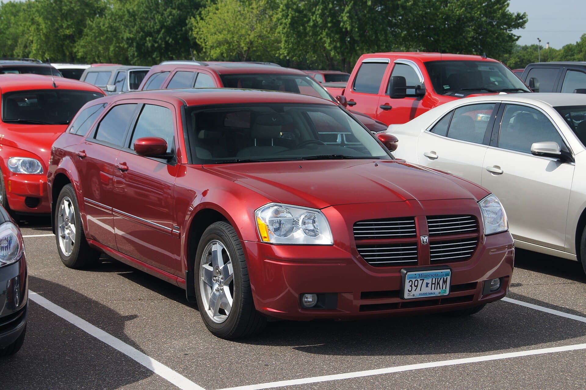 Used car parked in a dealership row